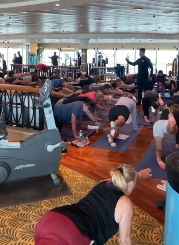 A deck yoga class led by Bassam