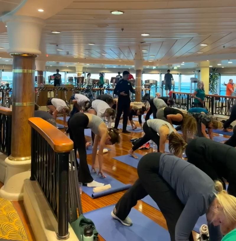 Bassam guiding a group yoga session